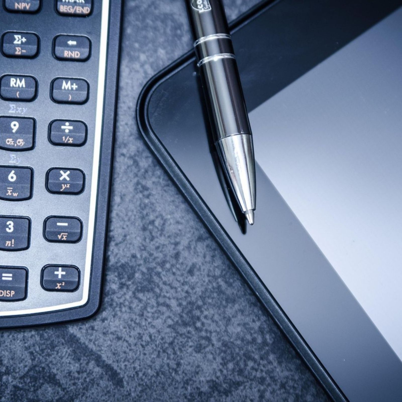 calculator pen tablet taxes finances financial tax