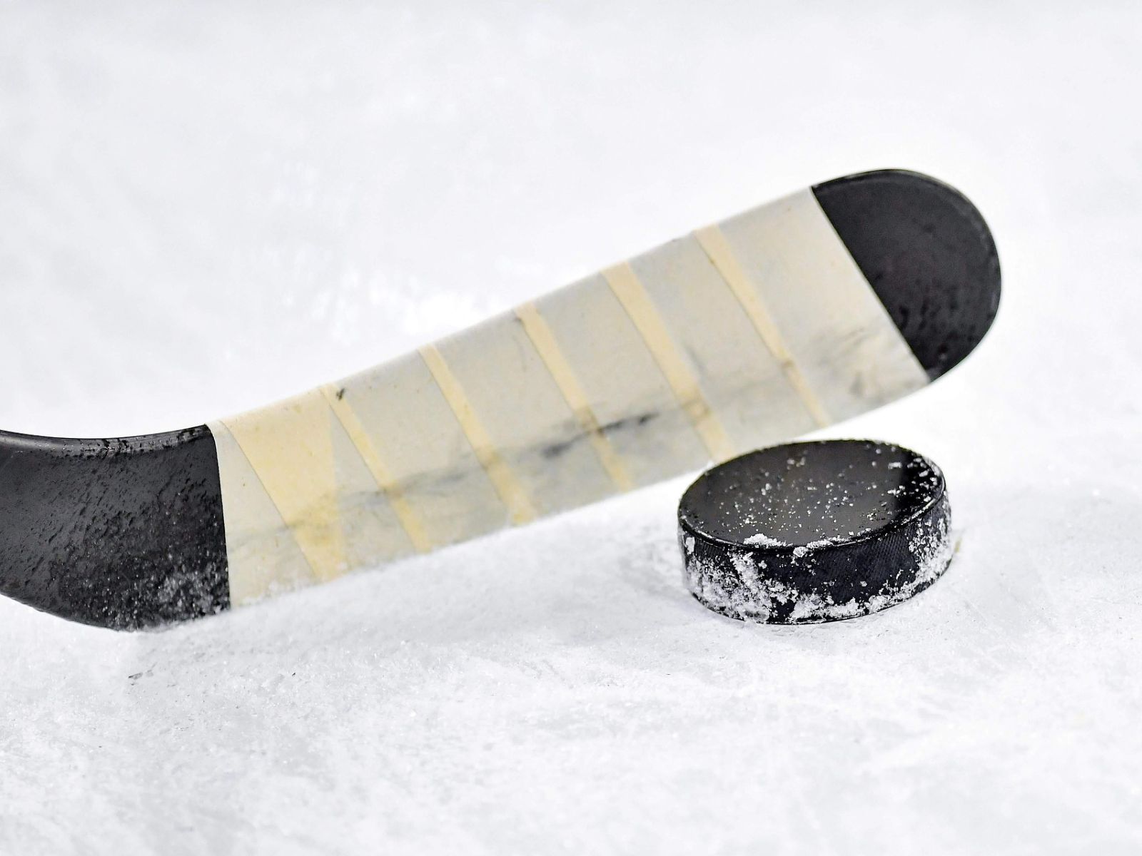 hockey stick and puck