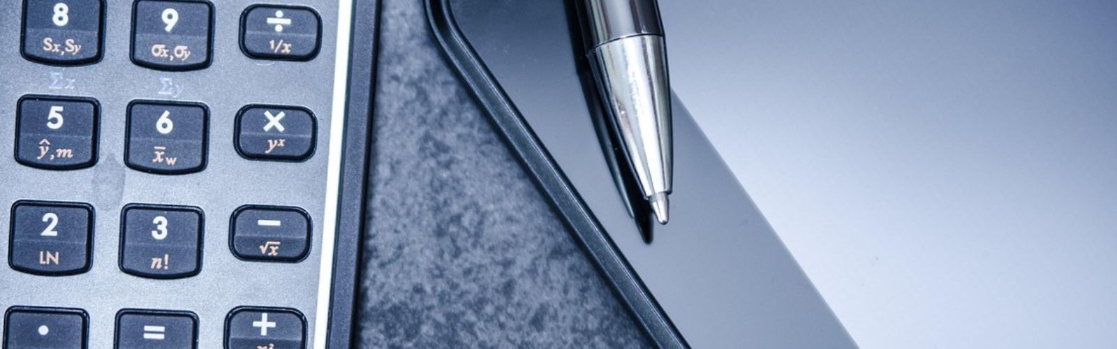 calculator pen tablet taxes finances financial tax