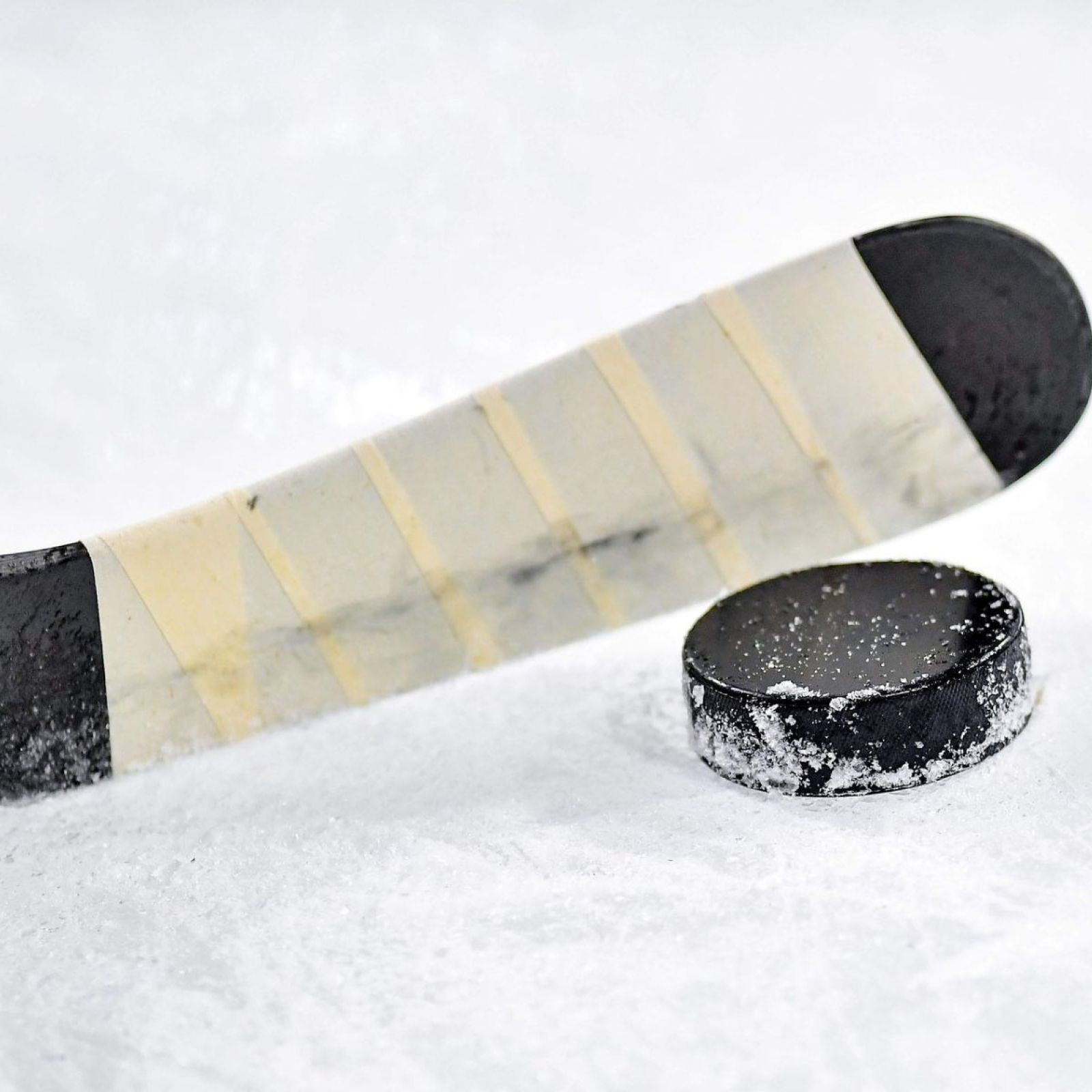 hockey stick and puck