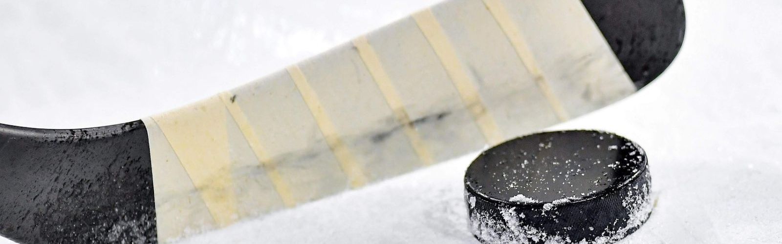 hockey stick and puck