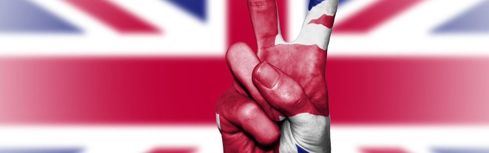 United kingdom flag peace hand sign
