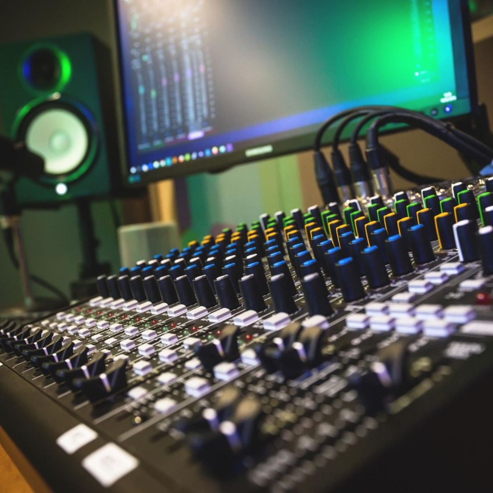 recording studio mixing board microphone computer screen speaker